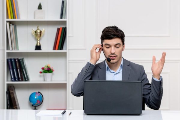customer-service-handsome-man-grey-suit-with-computer-headset-talking-computer